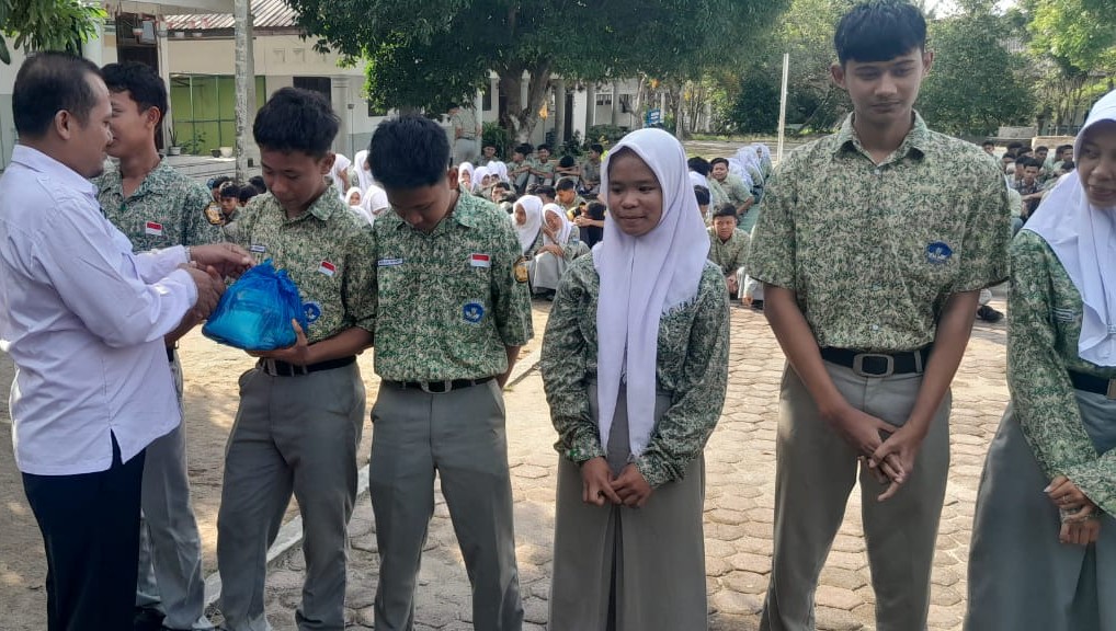 SMKN 4 Tebing Tinggi - SMK Negeri 4 Tebing Tinggi Salurkan Donasi untuk Korban Banjir